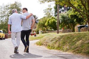 Two men walking and mentoring each other in christ.