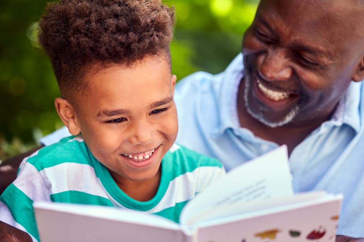 A father reading with his son.